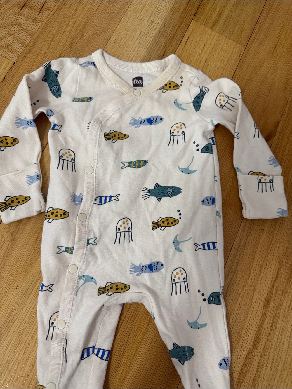 Tea Collection White One-Piece Baby Romper with Blue & Yellow Sea Life Print